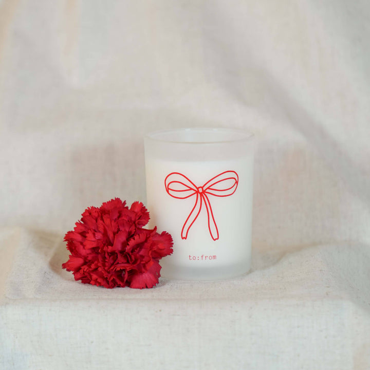 Bow: Peach & Rosemary Candle